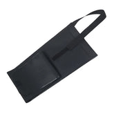 Black apron with a strap on a white background