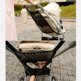Collage of a stroller with a net bag attached, showing different angles.
