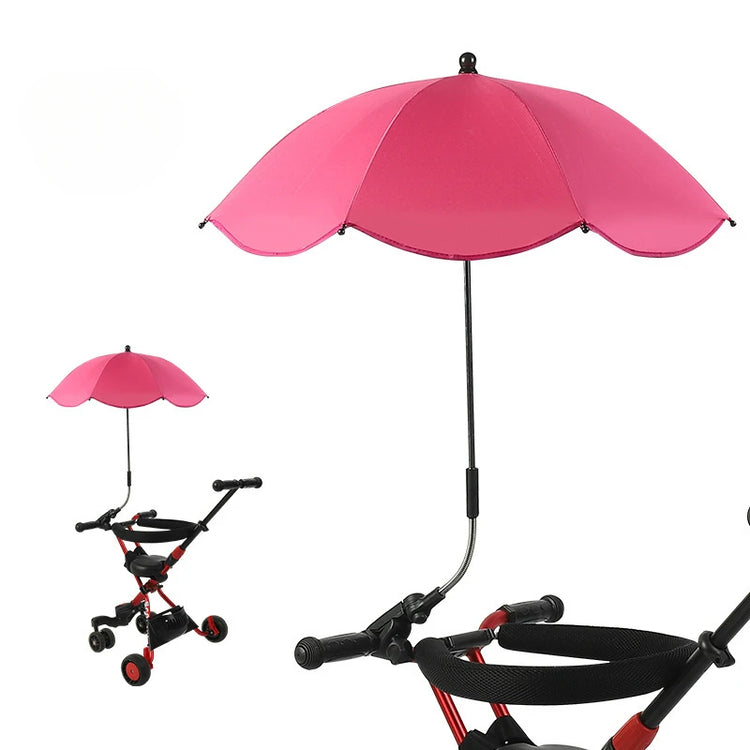 Pink umbrella attached to a stroller on a white background