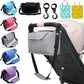 Gray stroller organizer with various colorful bags and accessories on a white background