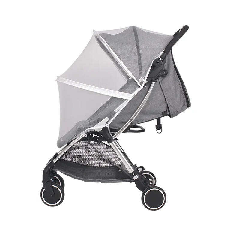 Gray stroller with a mesh canopy on a white background