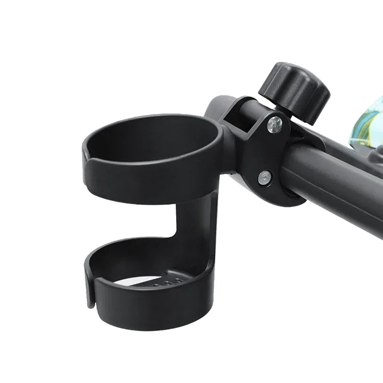 Black baby stroller cup holder attached to a strollerframe on a white background
