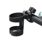 Black baby stroller cup holder attached to a strollerframe on a white background