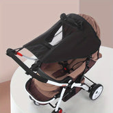 Black and brown baby stroller on a white background