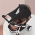 Black and brown baby stroller on a white background