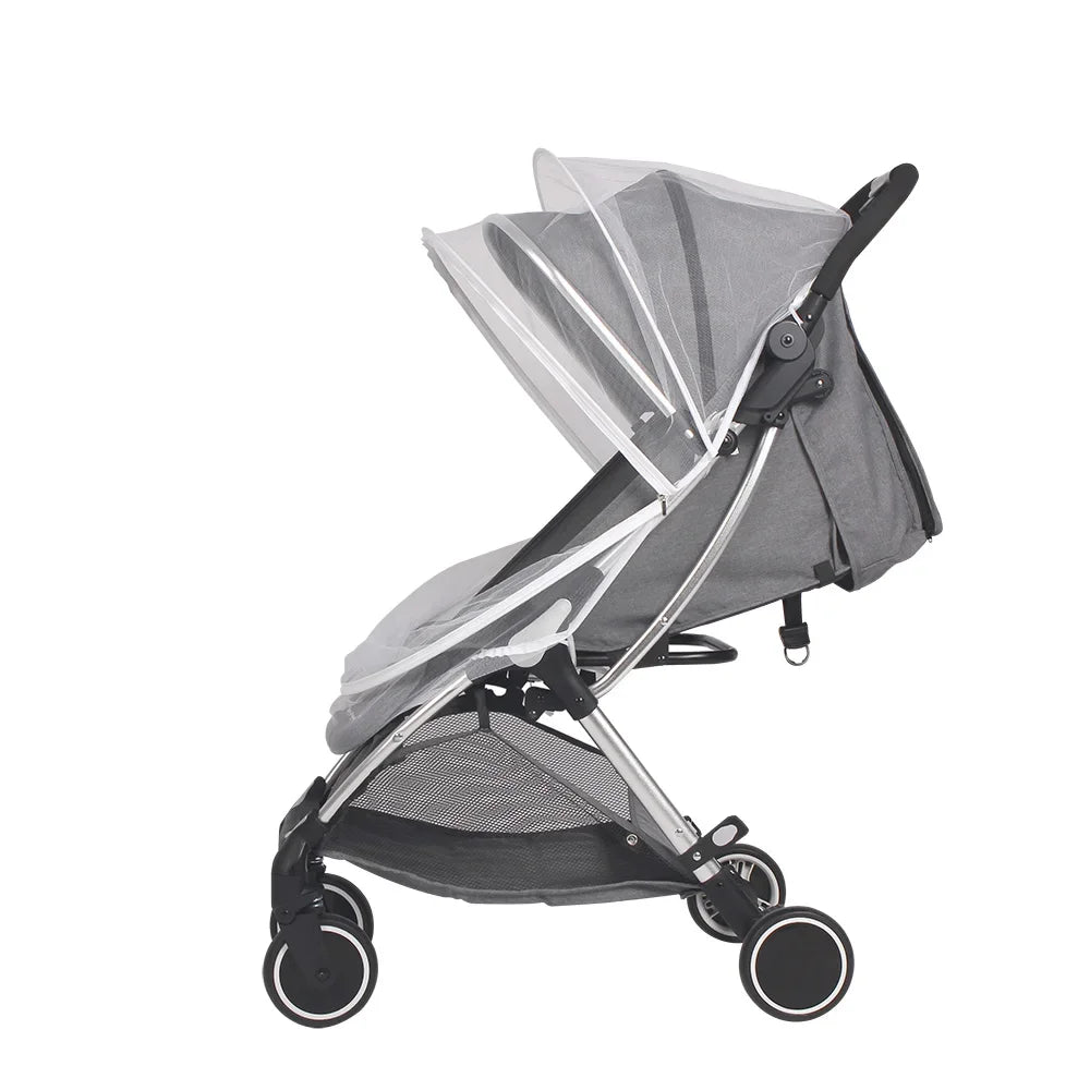 Gray stroller with a transparent canopy on a white background
