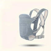 Gray baby carrier on a light beige background