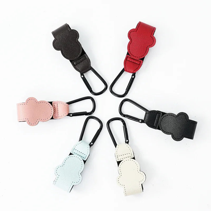 Set of colorful baby clip holders arranged in a circle on a white background