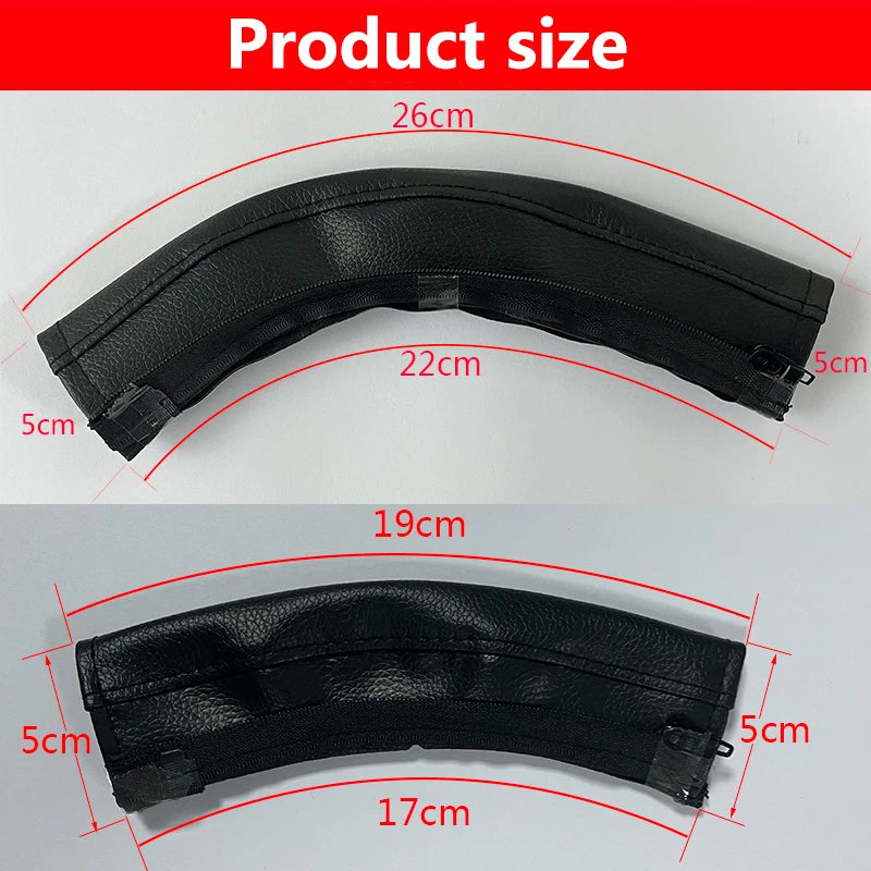 Black leather stroller handle cover with measurements on a white background