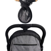 Close-up of a baby car seat with a mesh cover on a white background