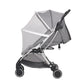 Gray stroller with a mesh canopy on a white background