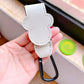 White leather strap with a black carabiner held by a hand, with a blurred background.