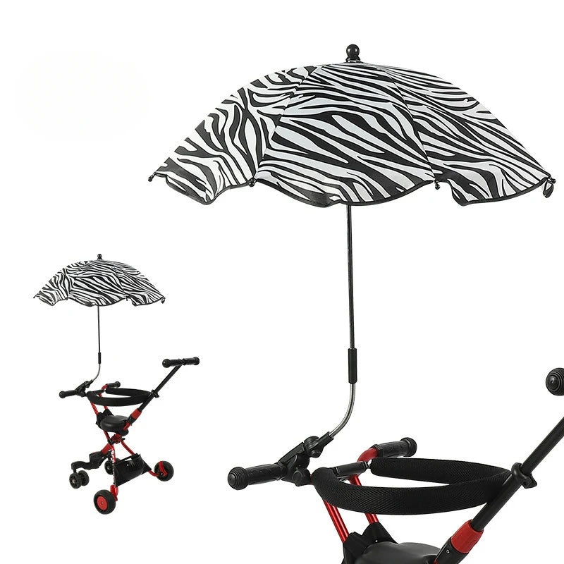 Zebra print umbrella attached to a stroller on a white background