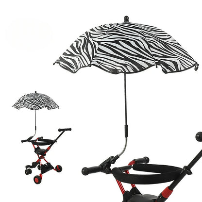Zebra print umbrella attached to a stroller on a white background