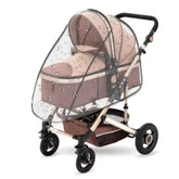 Baby stroller with clear rain cover on a white background