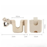 Measurement chart of a beige plastic clip and holder on a white background